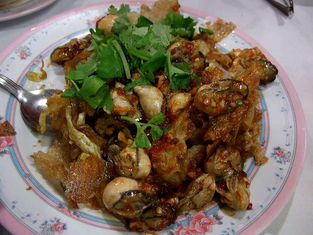 cooked mussels, eggs, bean sprouts, and green onions. - best thai food in thailand