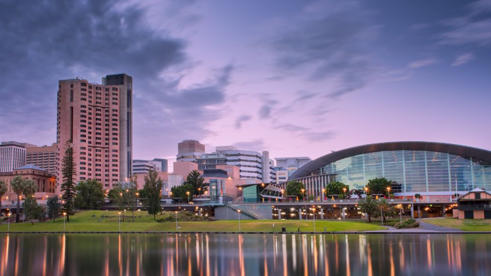 Modern buildings in front of body of water
