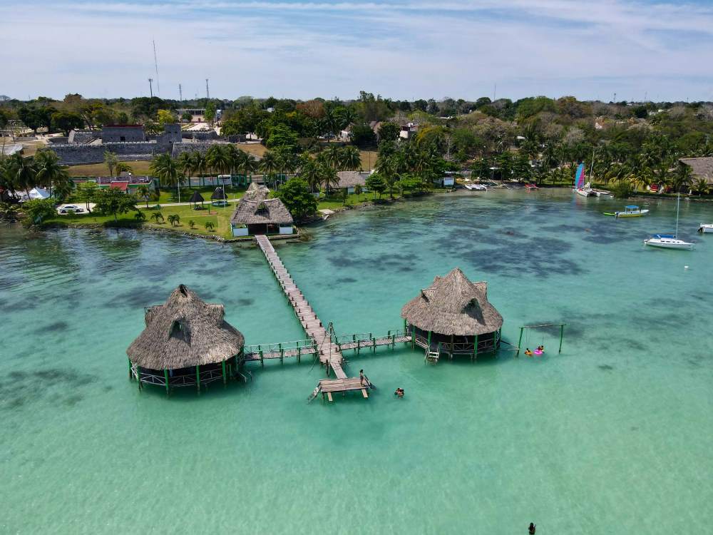 cottages over the body of water -25 Best Places to Visit in Mexico
