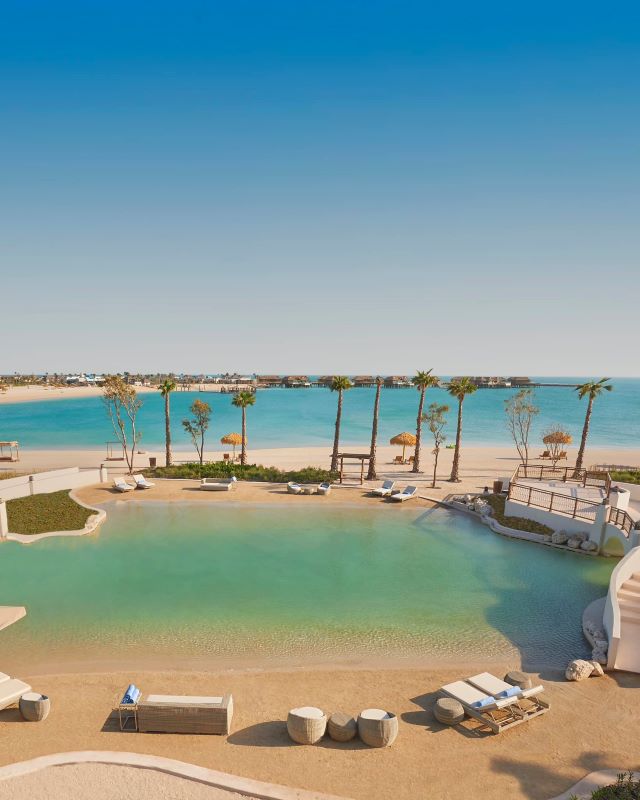 aerial view of a pool near the ocean
