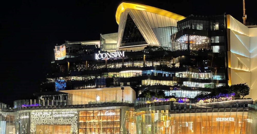 Big and wide ultra modern building full of lights