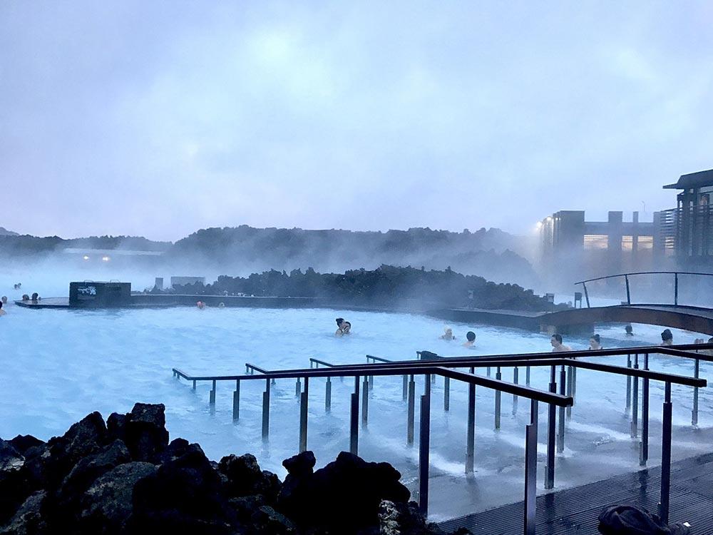 Famous iceland blue lagoon with people swimming in it