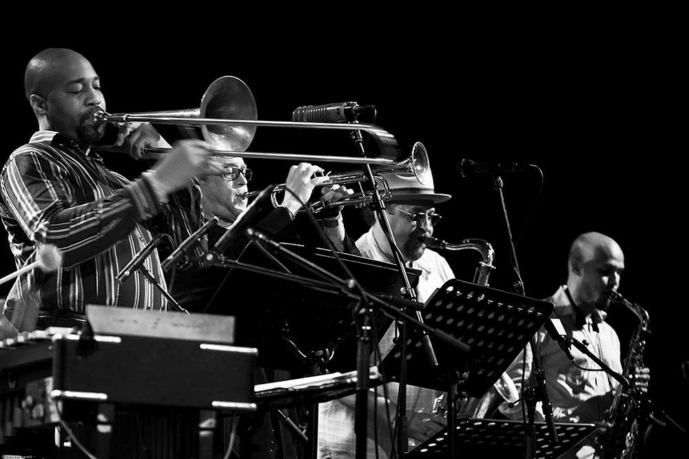 a black and white photo of jazz musicians perofrming during san fancisco sfjazz collective