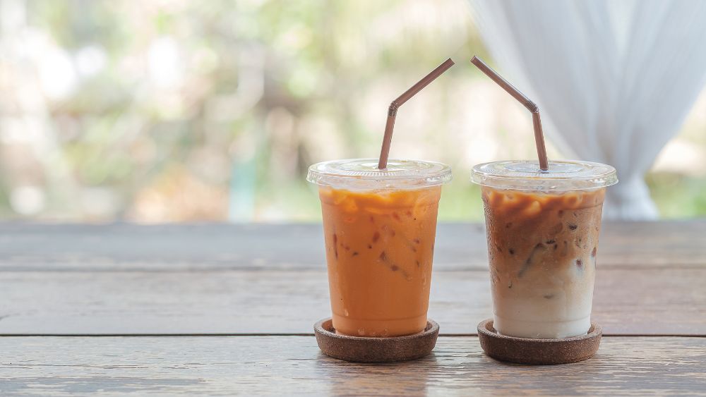 two ice coffee in a wooden table