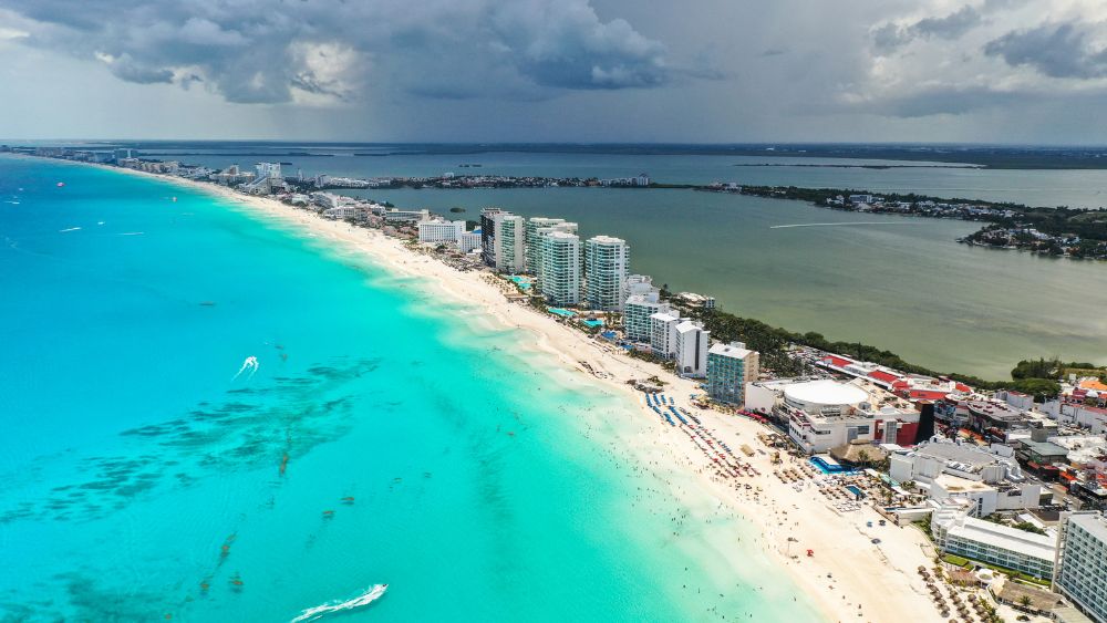 city with resort and buildings in between body of water
