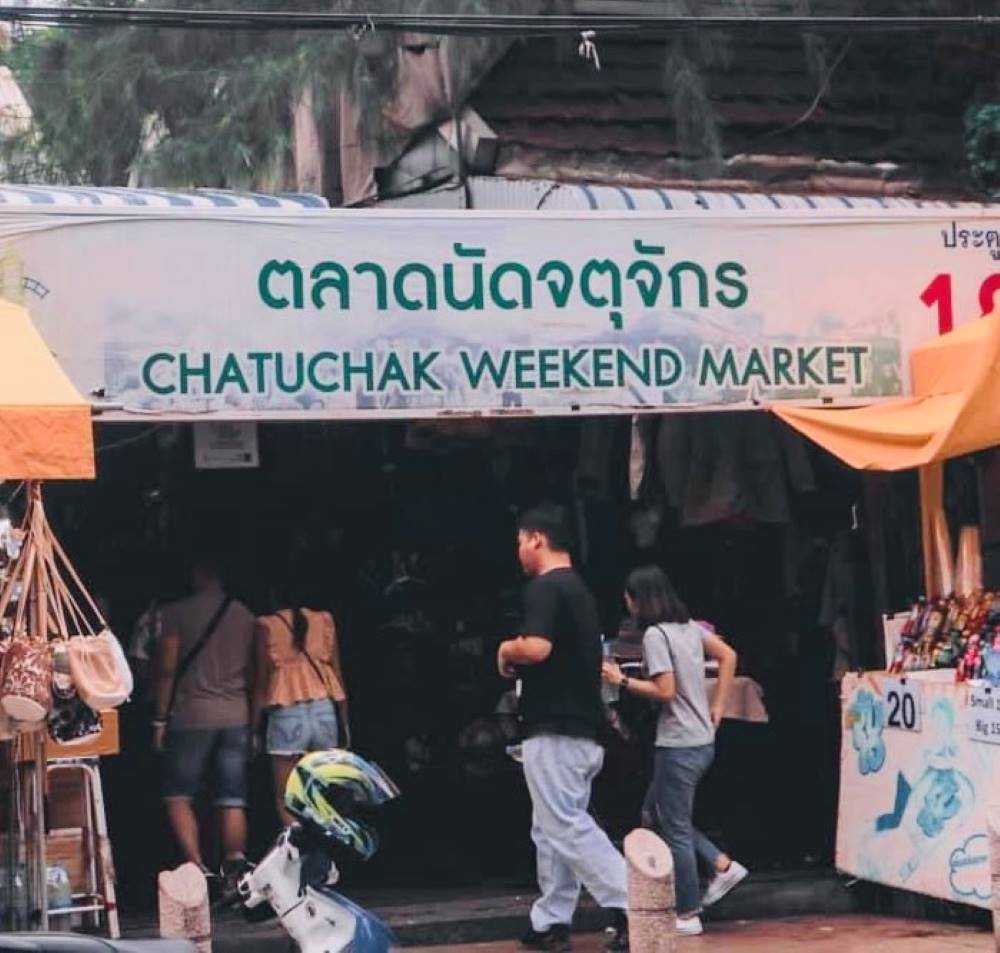 people walking inside the market