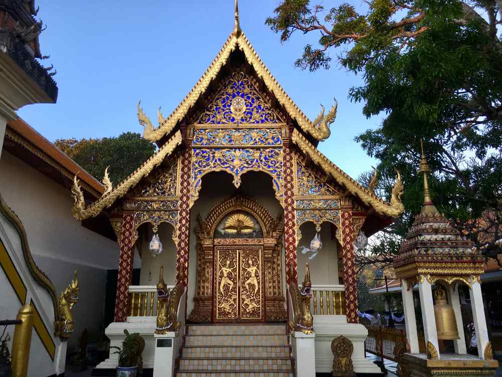 golden with red design structure with dragon statue design-best places to visit in thailand