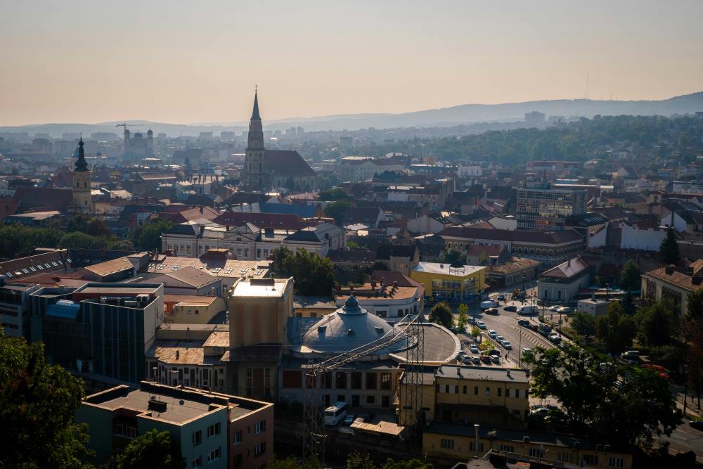 aerial view of the city showing buildings, streets and cars- romania digital nomad visa