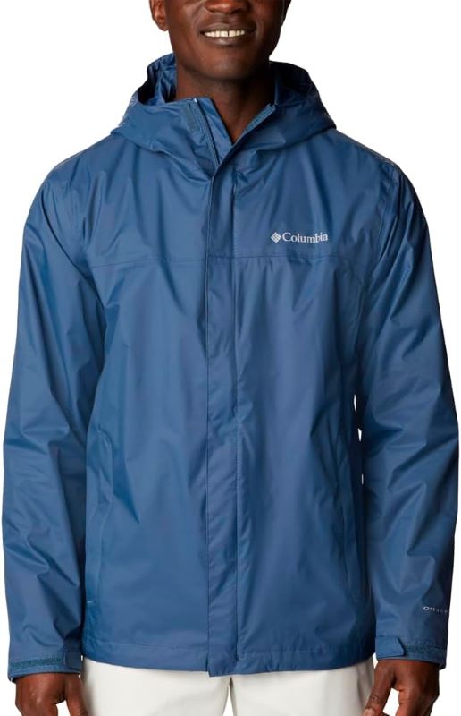 man wearing blue Columbia Men's Watertight II Jacket - best travel accessories