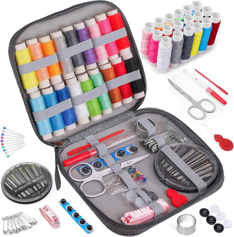 different colors of thread and needles in travel-sized sewing kit 