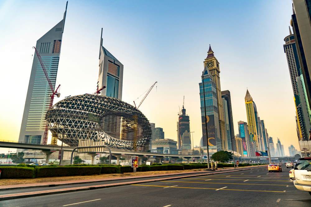 oval shape structure near the highway and highrise buildings- dubai digital nomad visa