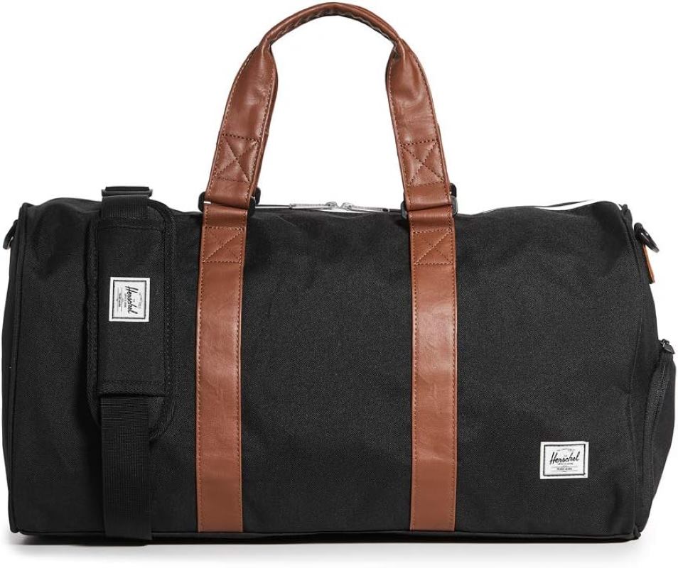 black duffle bag  with brown handle strap