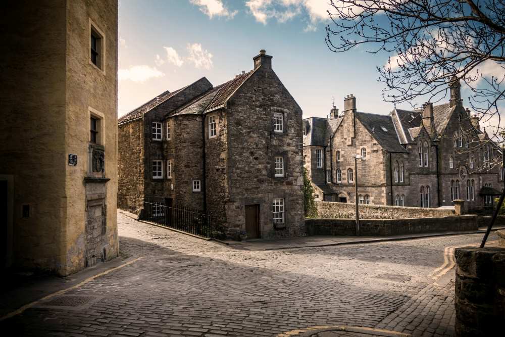 brown gray old concrete building- Things to Do in Scotland