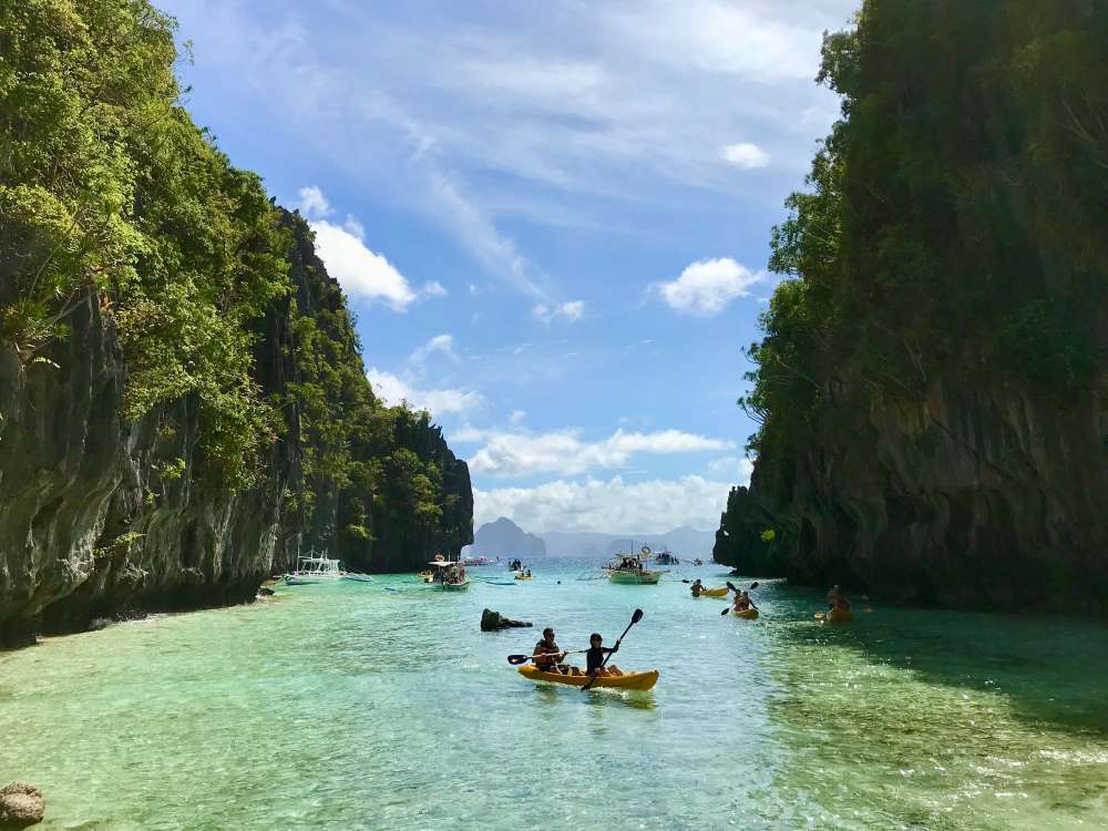 people sailing in the sea- philippines vs thailand