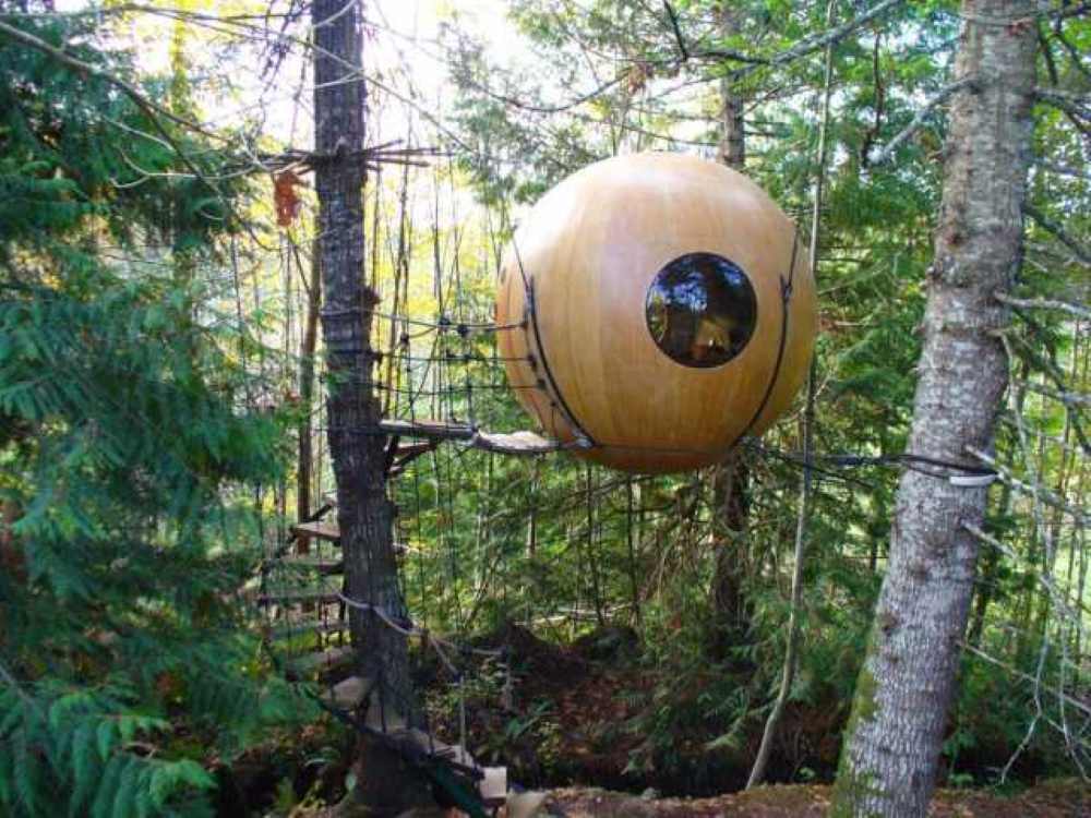 spherical treehouses in the middle of the forest - unique hotels in the world
