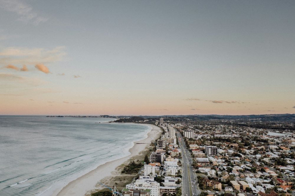 aerial view of a city near the beach - Best Beaches Near Brisbane