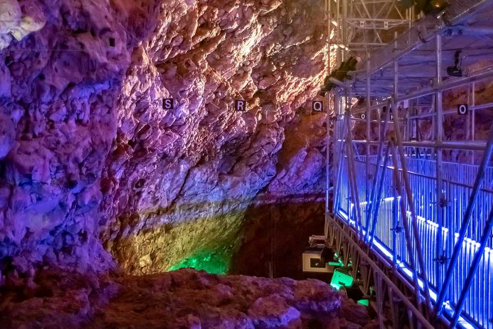 Colourful display of the archeological work inside the grotte du lazaret in Nice