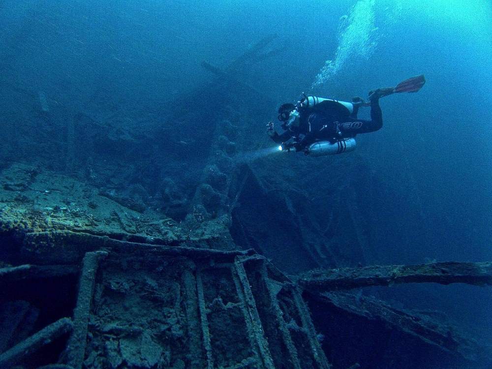 scuba diver bear a ship wreck - Best Scuba Diving in Australia