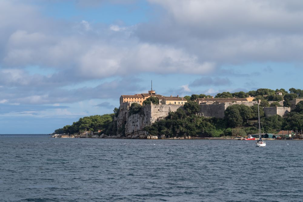 front view of a buildings in an island surrounded by the ocean