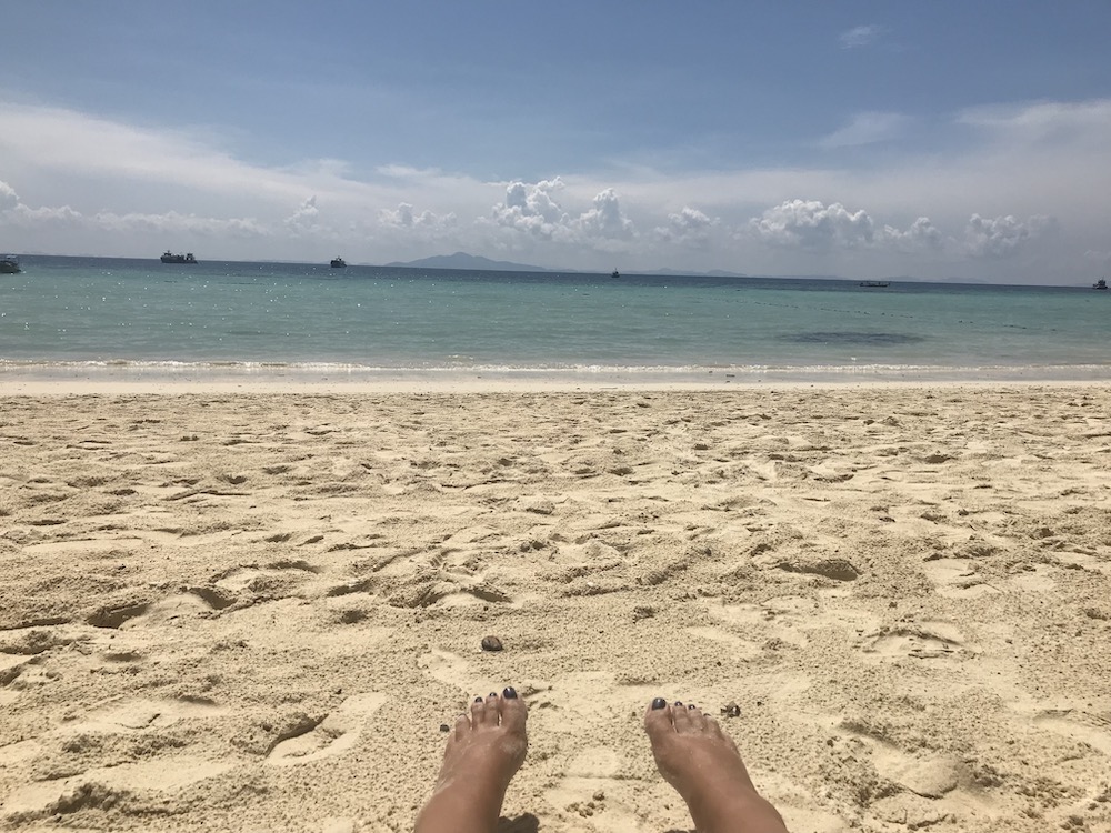 my feet pic in front of the beach