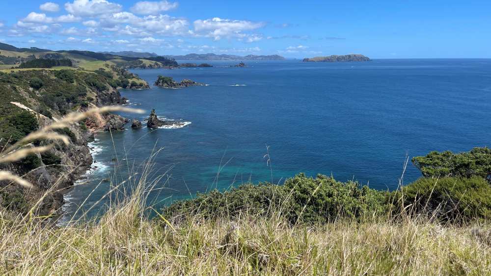 ocean view surrounded by rock formation