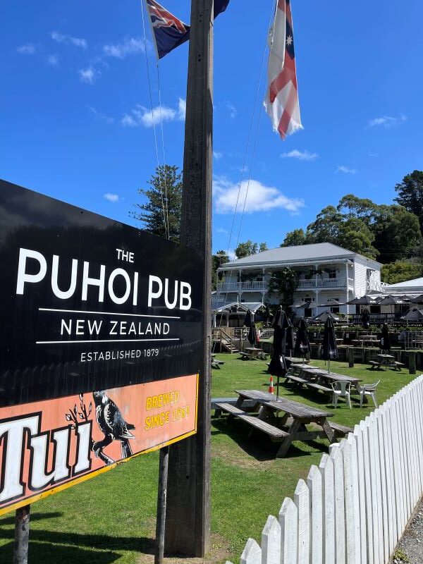 flag and signage newa white gate