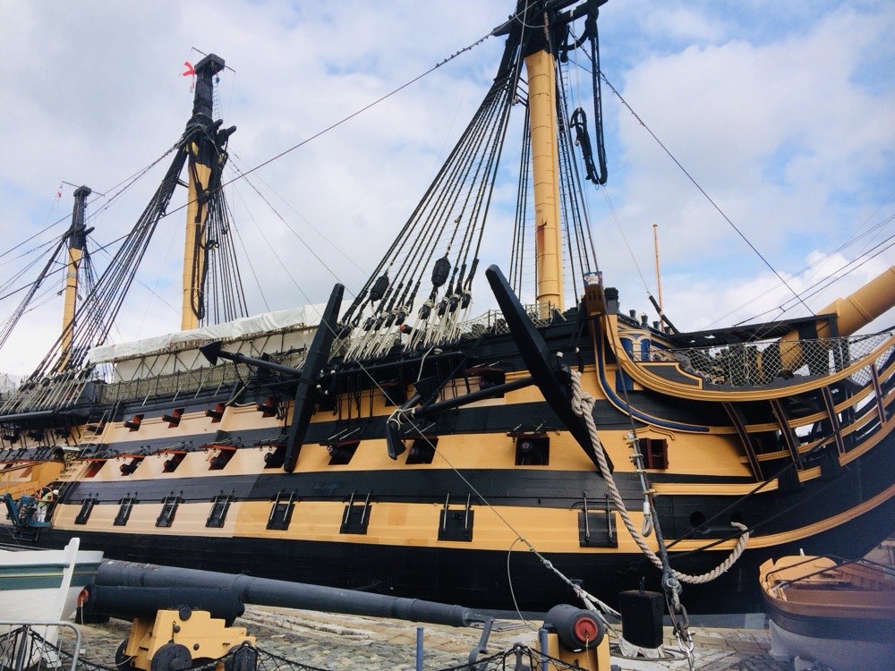 large brown black ship