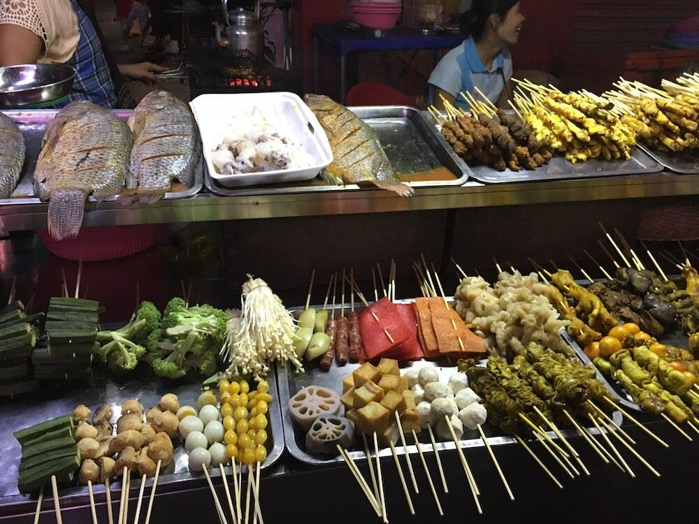 Different food on a stick known as the street food