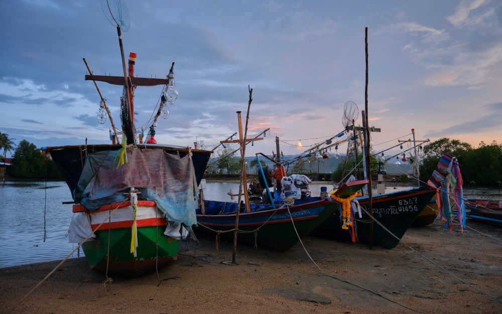 boat in the seashore with fishing equipments - Koh Samui vs Phuket