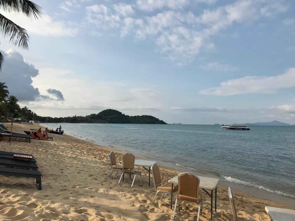 table and chair beside the beach - koh samui vs phuket