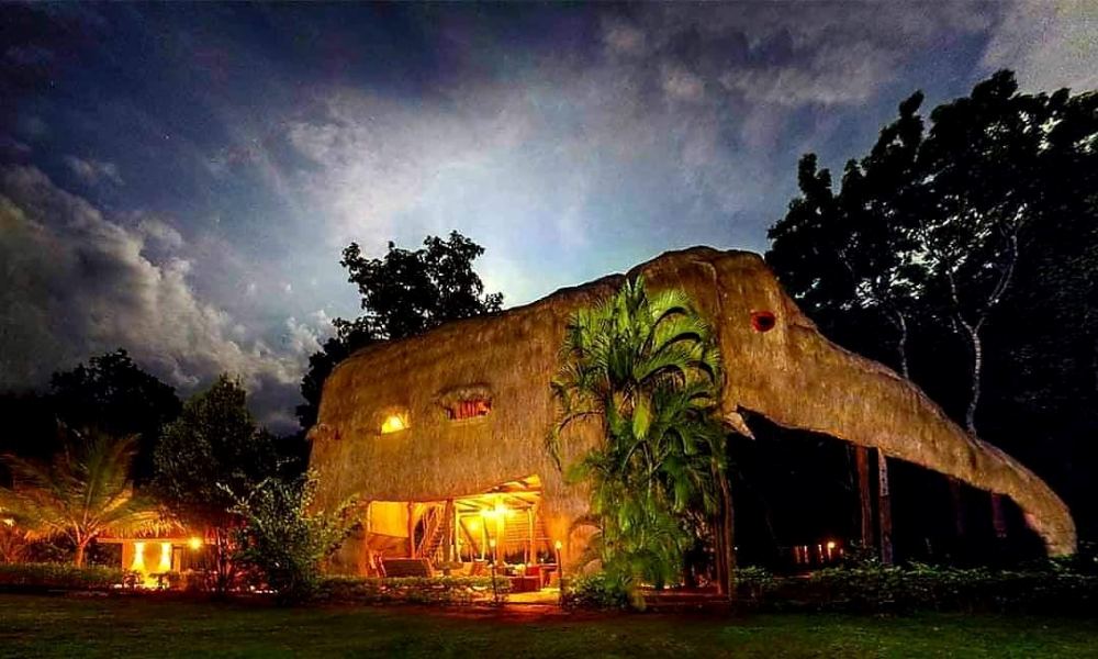 elephant-shaped villa made entirely of straw and natural materials