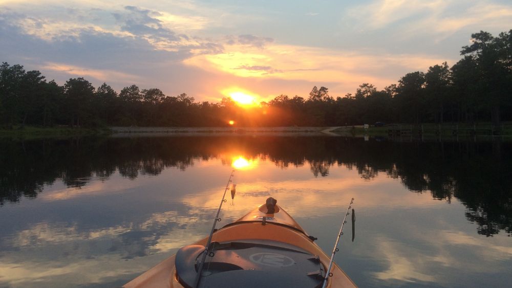 kayaking at the lake during sunset - Exploring the Sydney to Melbourne Coastal Road Trip