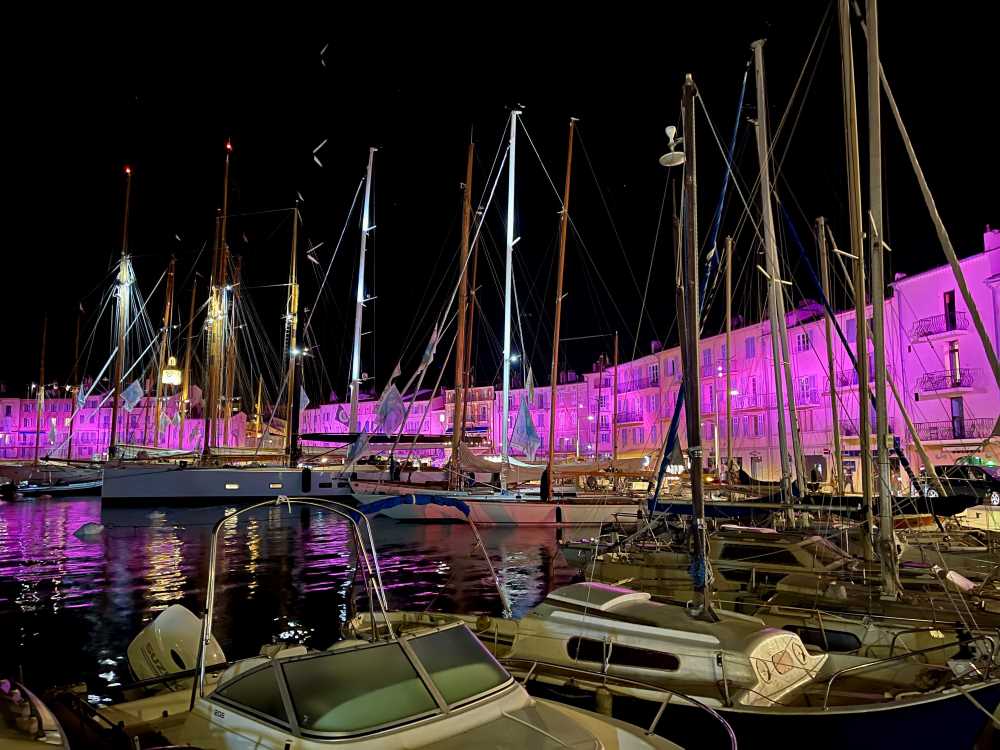 yacht at the body of water during night time
