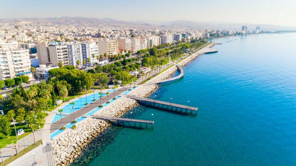 city with buildings and houses near the body of water- cyprus digital nomad visa