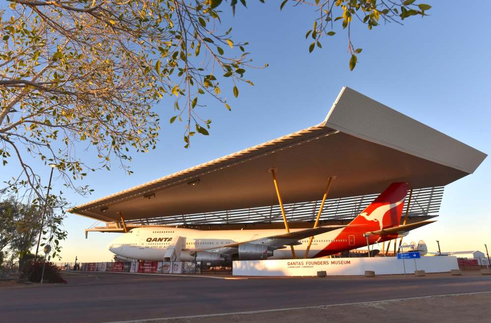 commercial airplane at the middle of the open park - Best Places To Visit In Queensland