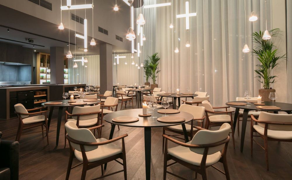 classy table and chairs in a restaurant- 30 Unique Things to Do in Manchester UK