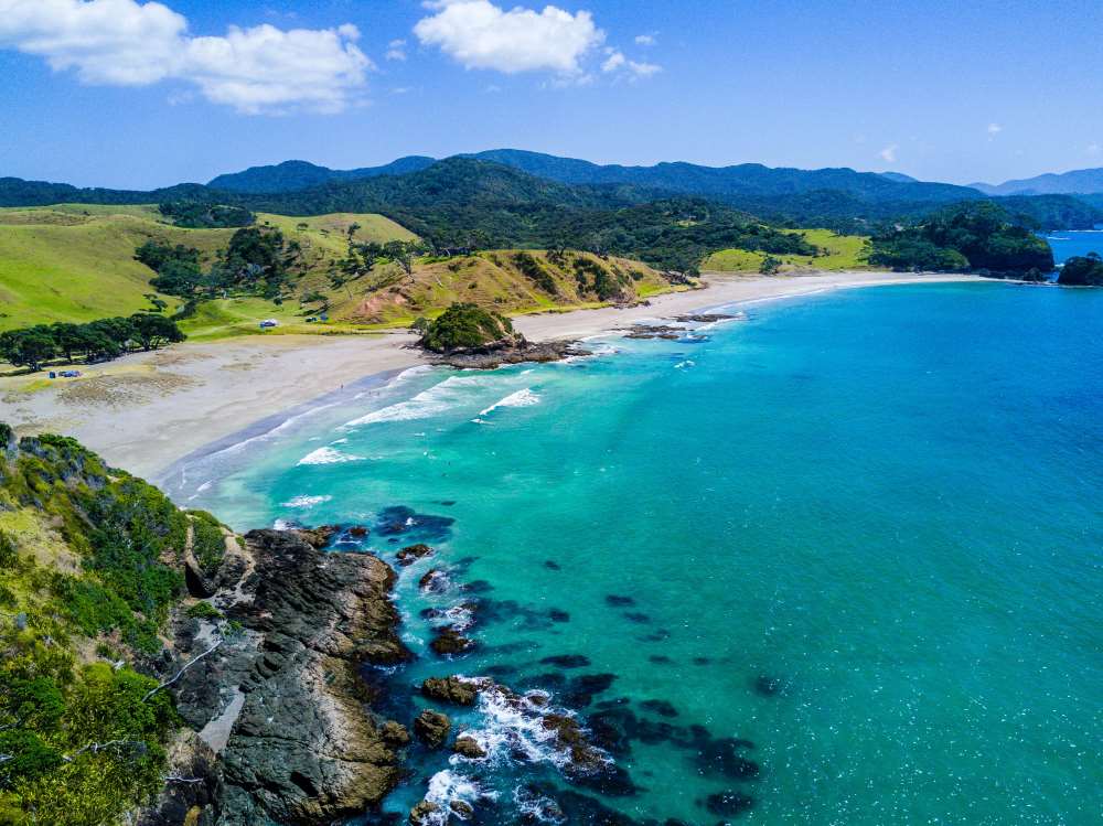 beache near valley and hill