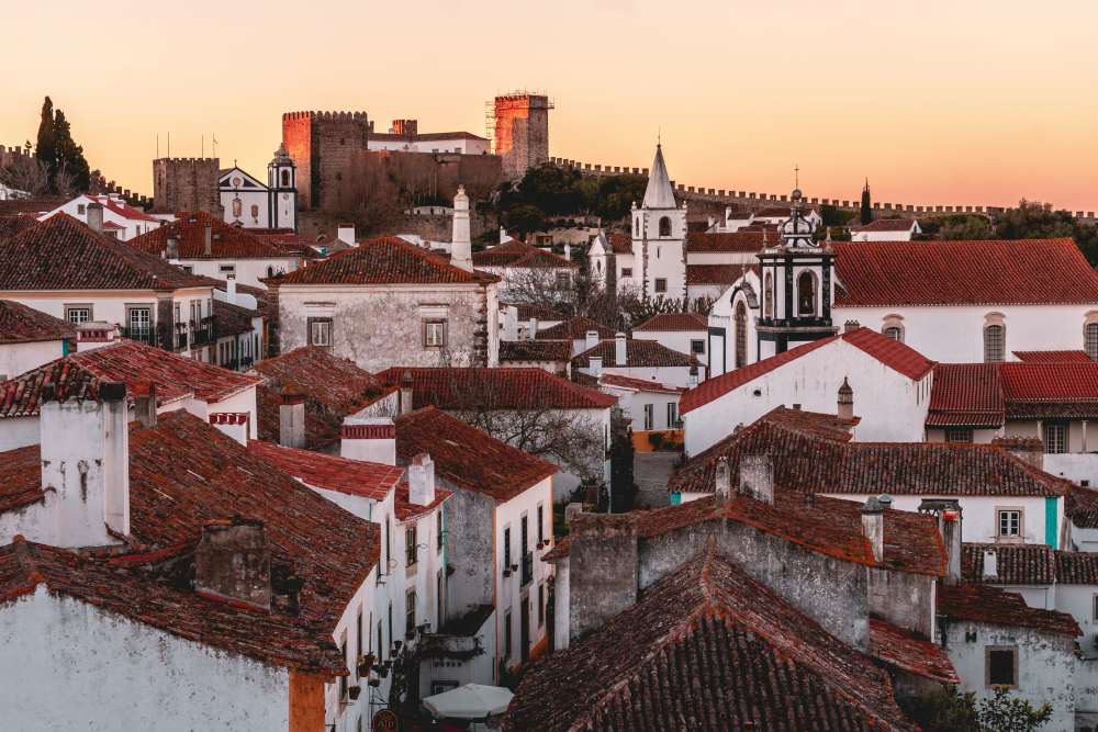 white houses and red roof - medieval villages in europe