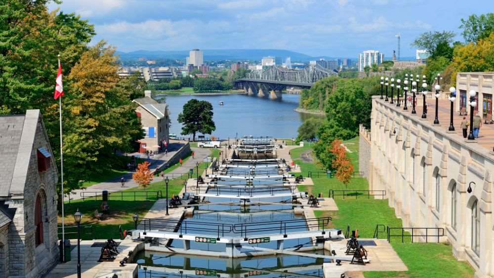 small bridge in the middle with buildings on the side- canada digital nomad visa