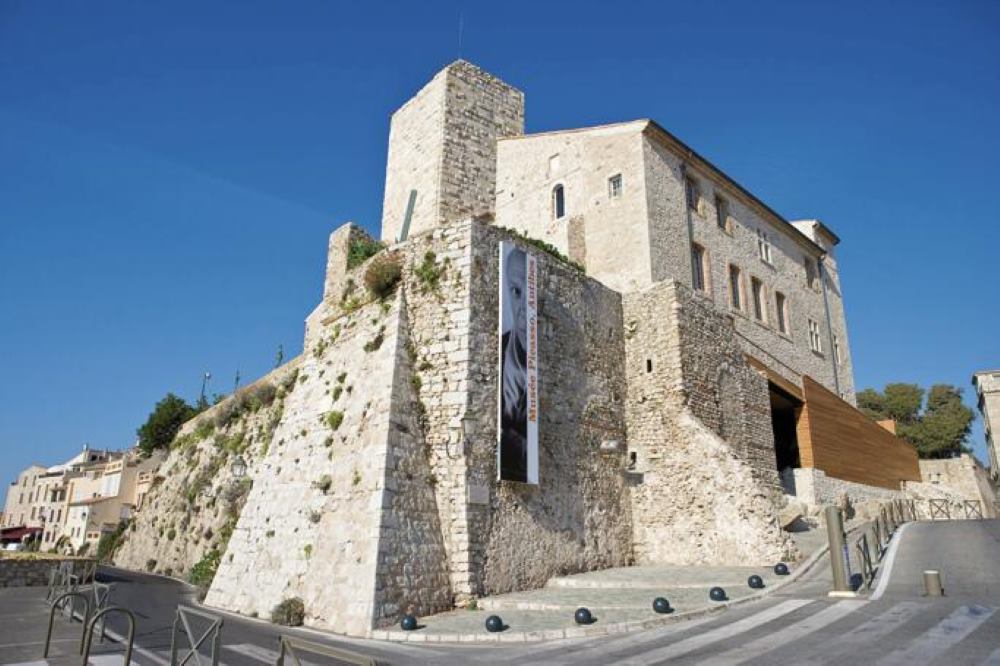 historic castle building near the road