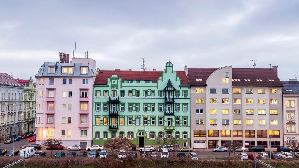 colorful buildings in front of the street with cars in front- czech republic digital nomad visa