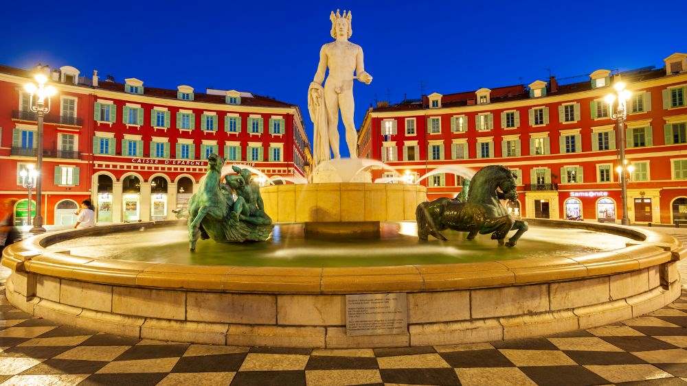 statue of a man showing his genital along with statue of horse in the middle of the fountain - Things to do in Nice, France