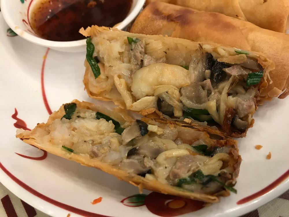 pork and veggies inside as spring rolls- best thai food in thailand