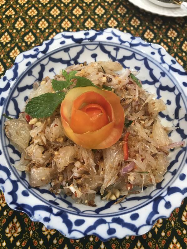 Pomelo segments top with flower design tomato
