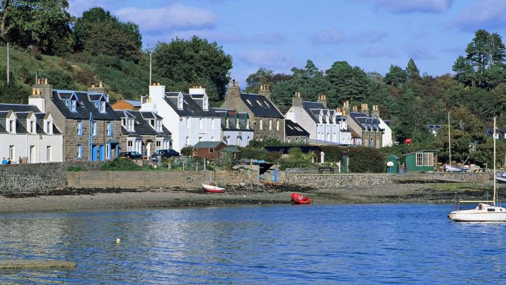 houses or village in front of body of water