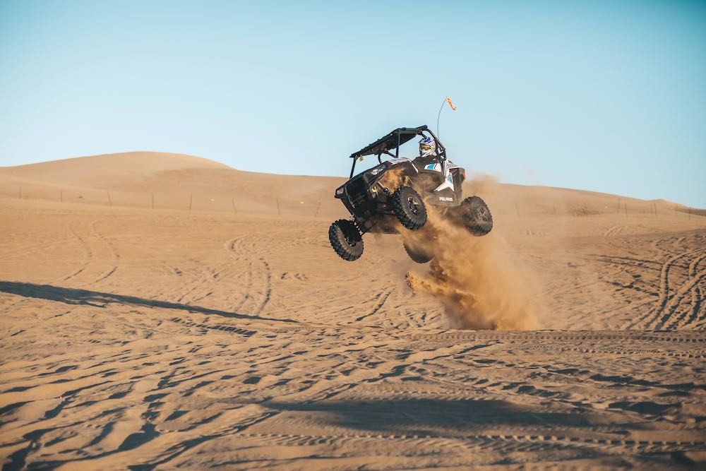 flying atv in the sand desert