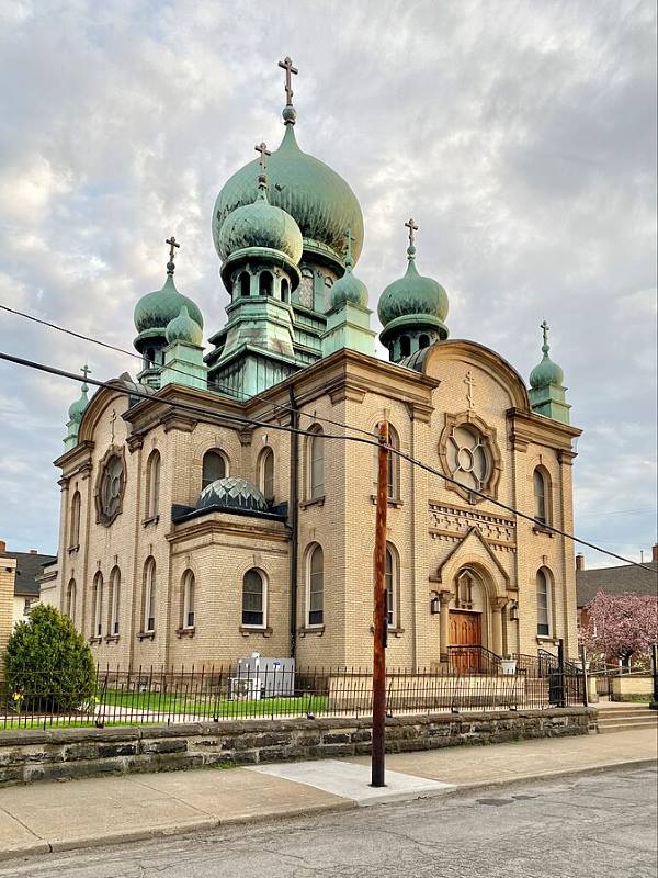 image of the church structure features onion-shaped domes and intricate mosaics