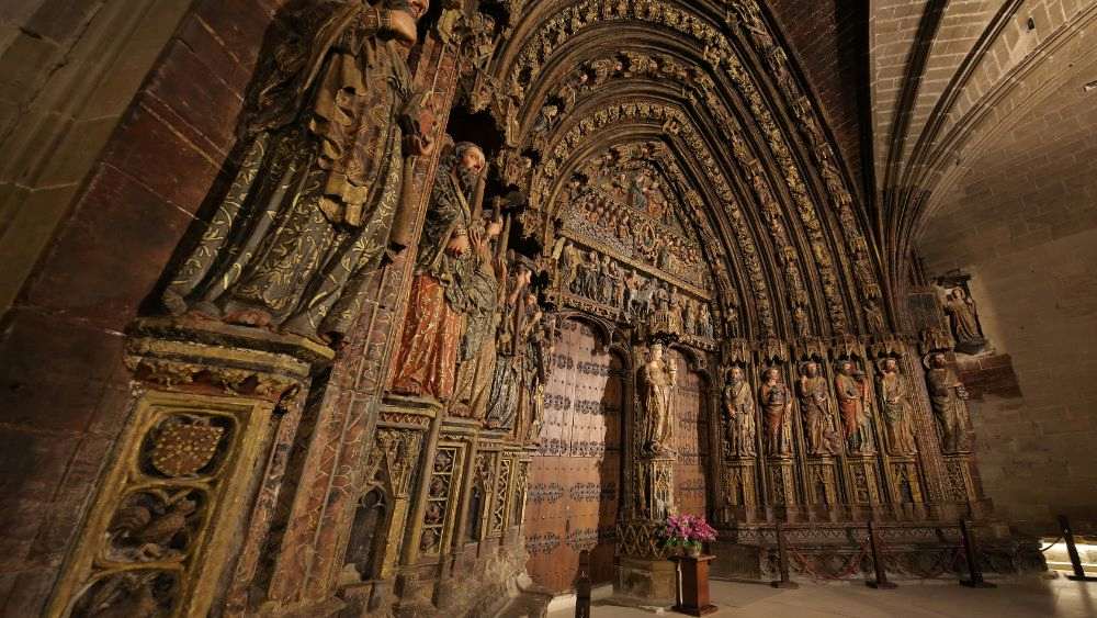statue of saints line up - medieval villages in europe