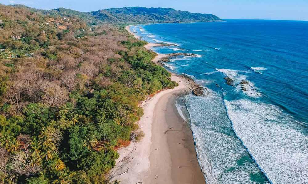 secluded beach at the Santa Teresa Beach, Nicoya Peninsula with small waves