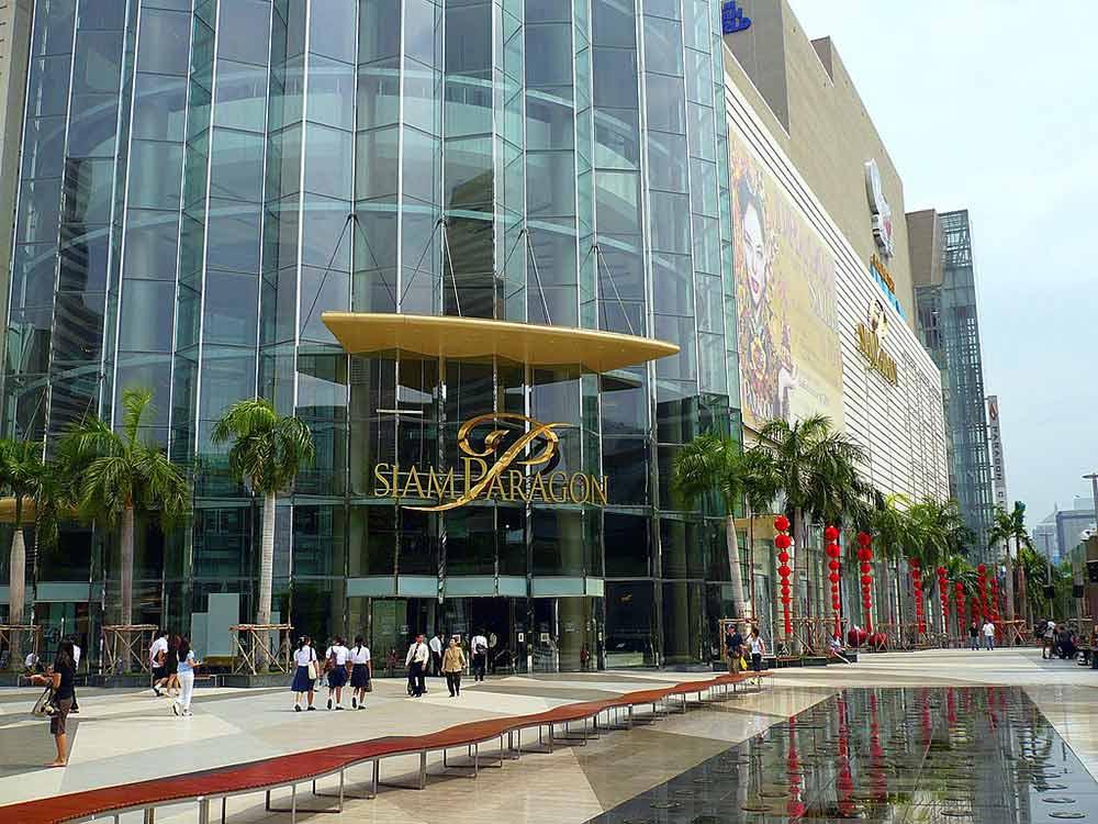 tall and wide building with glass on the front